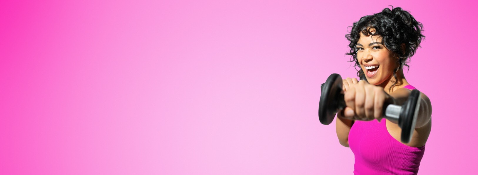 woman holding a dumbbell